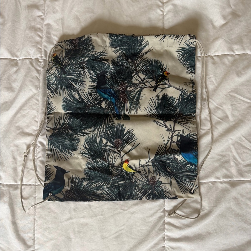The North Face Drawstring Backpack - Cream and Blue